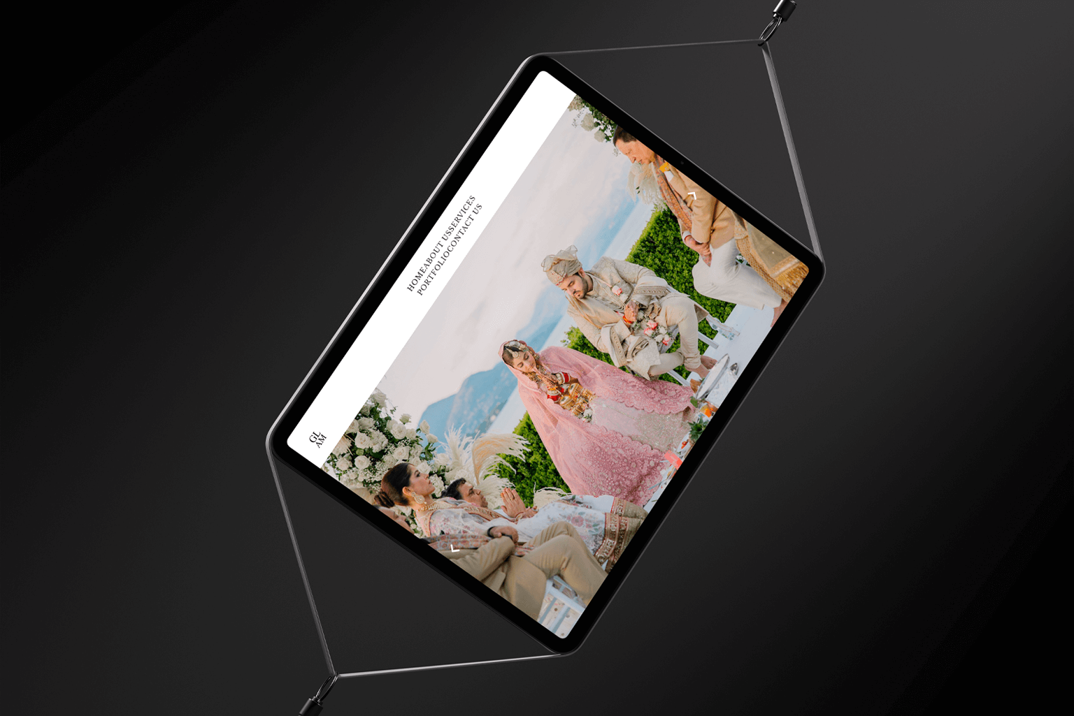 A tablet displaying a wedding Glam website with an image of a traditional outdoor wedding ceremony.