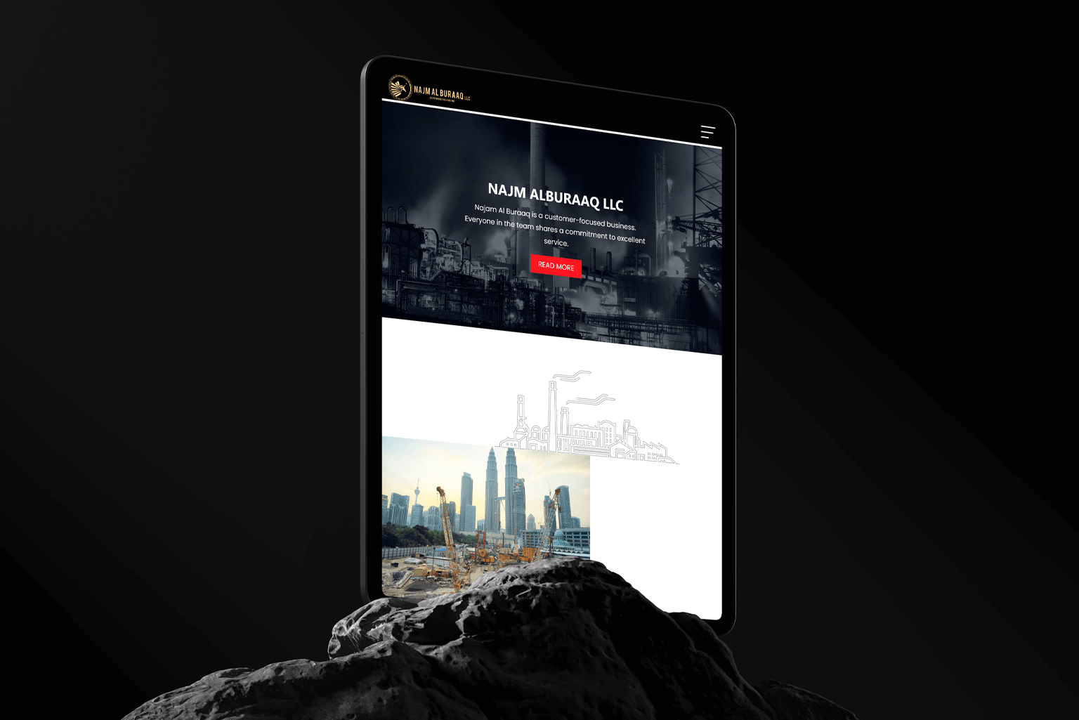 Tablet displaying the construction company website Najam Al Buraq.